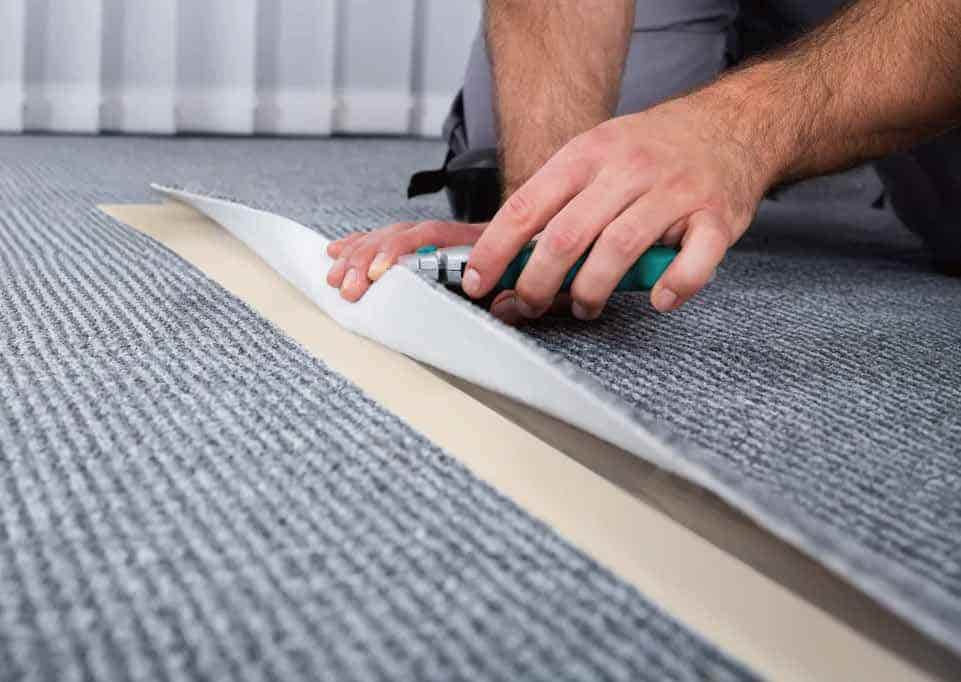 Heavy duty floor bonding tape holding carpet flat for safer high-traffic areas.jpg